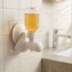 Side profile of wall-mounted liquid soap dispenser with suction cup