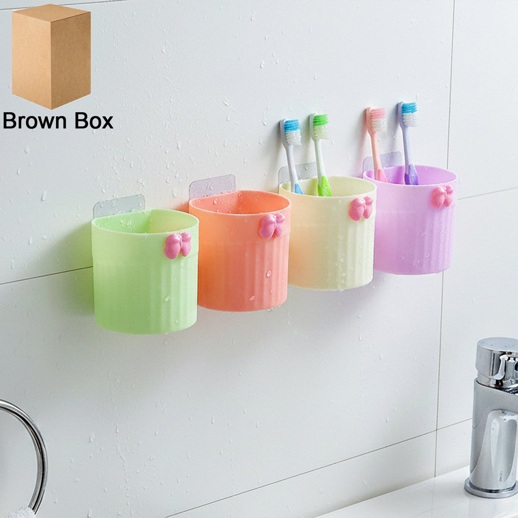 Wall mounted toothbrush holder displaying 4-piece bathroom organizer set