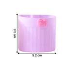 Adhesive toothbrush holder stand attached to smooth bathroom wall