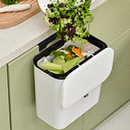 Portable plastic kitchen dustbin with lid for compact spaces