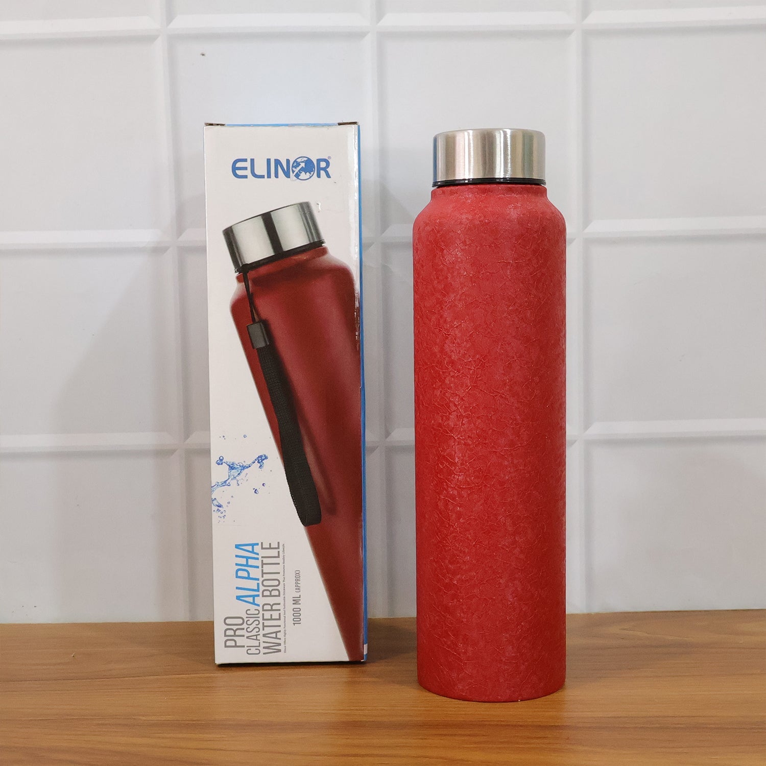 Usage of red stainless steel insulated water bottle during activities