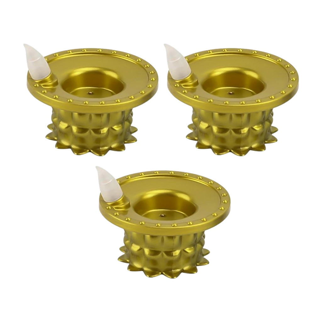 Three golden flameless LED diyas with a traditional design.