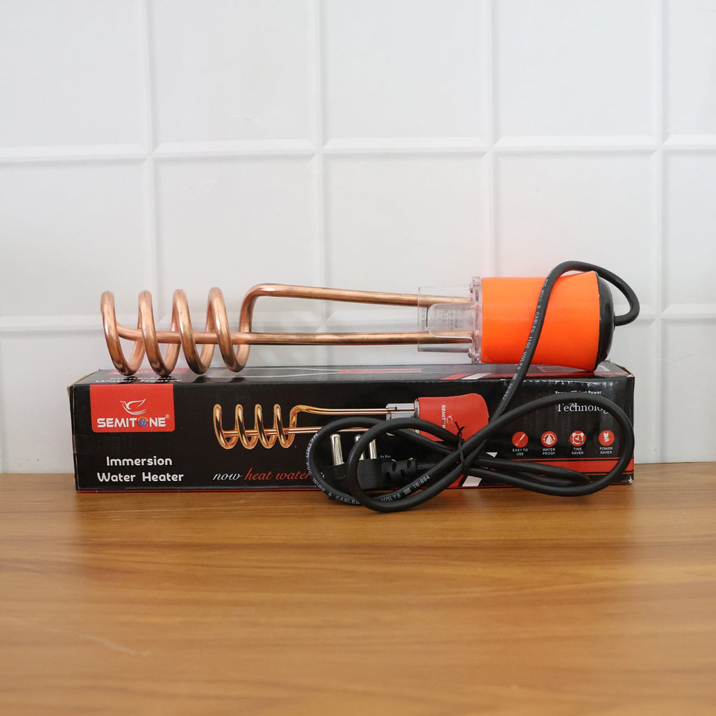 Immersion water heater rod heating water in household bucket