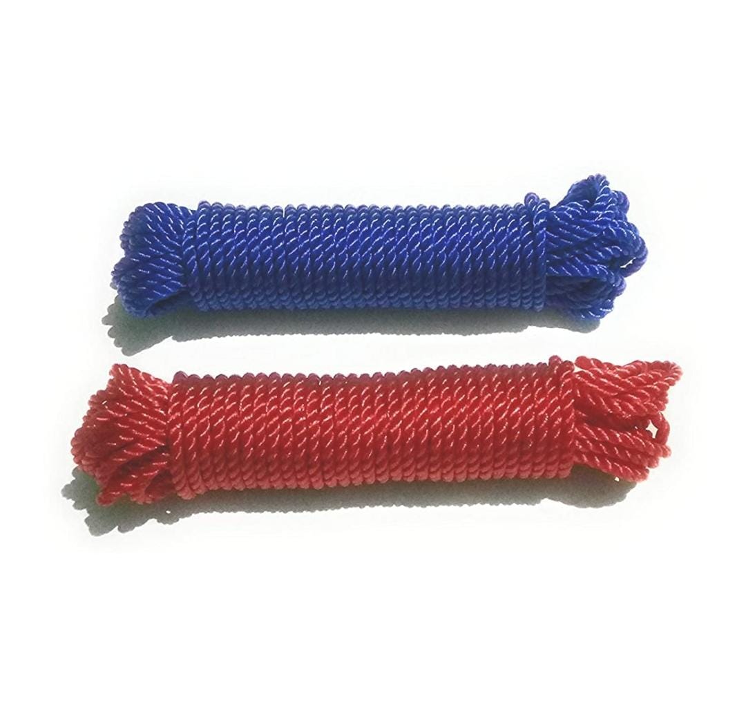 Hand holding a segment of the strong, flexible multipurpose rope in mixed hues.