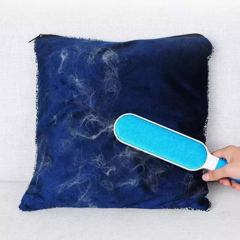 The efficient double-sided pet fur remover, demonstrating its easy cleaning process.