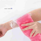 Person using the silicone back scrubber for a deep and relaxing shower.