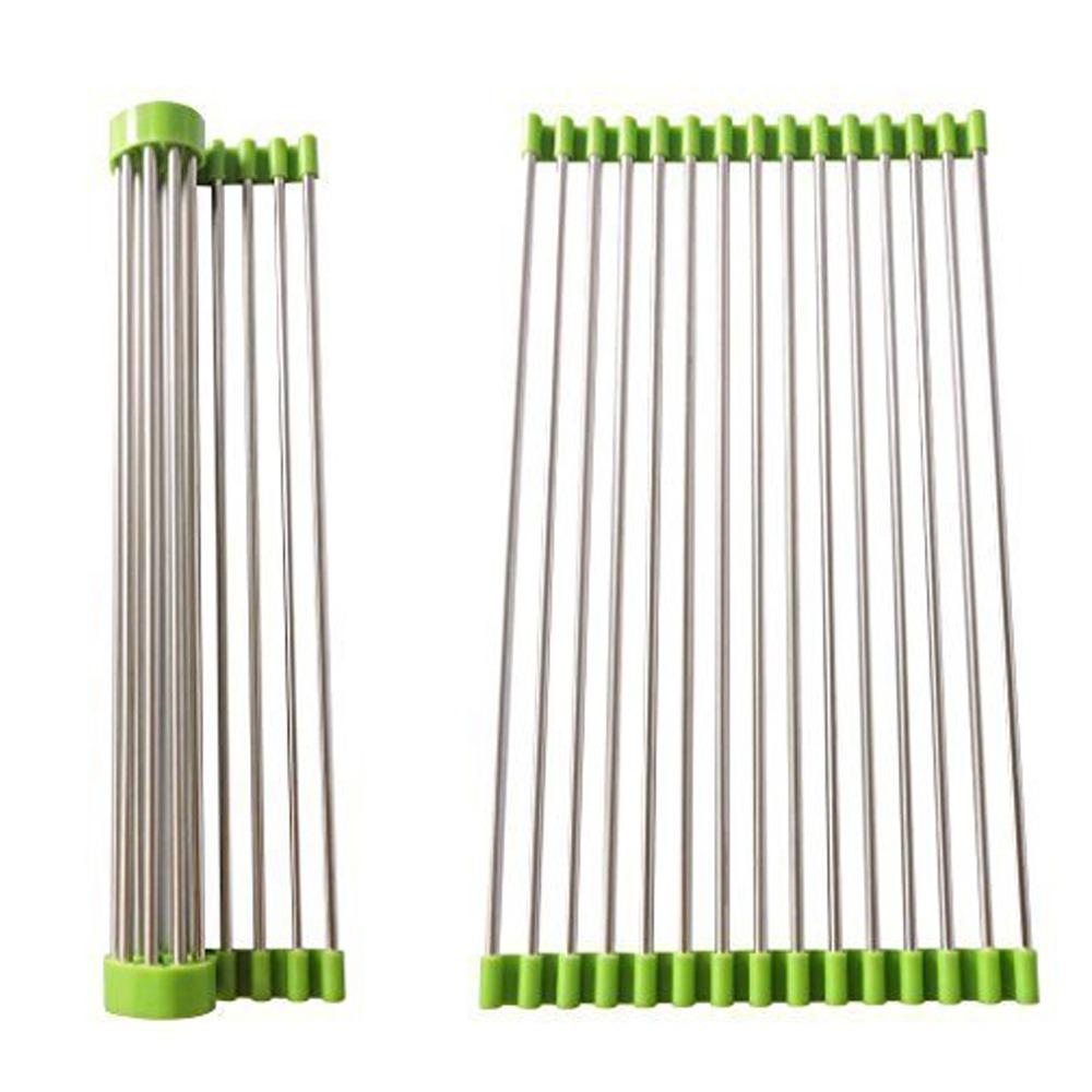 Stainless steel kitchen sink drain rack, extended over a sink for drying dishes.