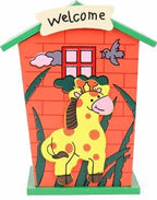 Top view of the cartoon house wooden piggy bank, highlighting its compact size.