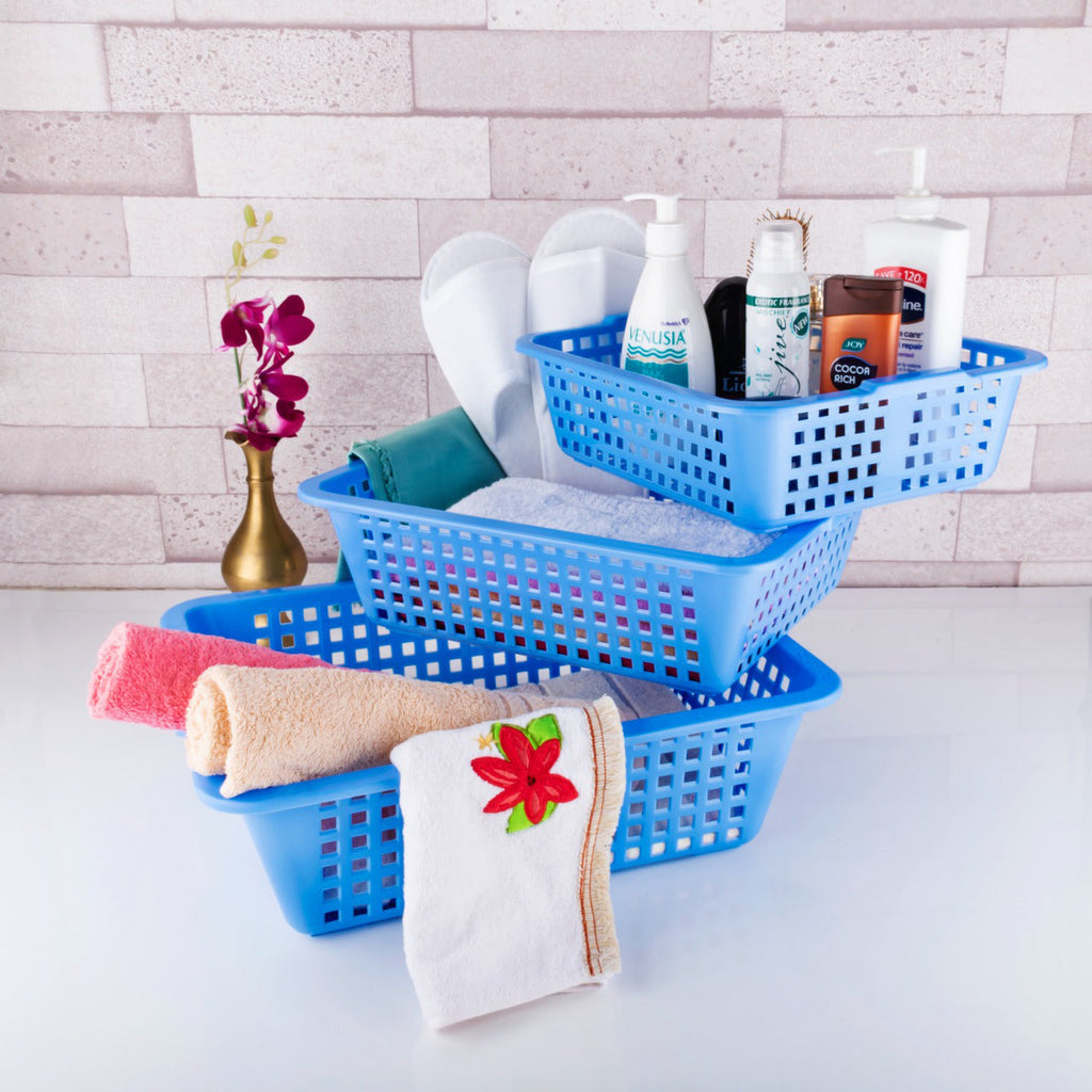 Three nested plastic cane fruit baskets, showcasing their versatile sizes.