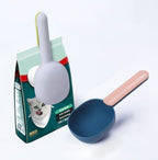 Pet food scoop with handle clip design, made from food-grade ABS plastic.