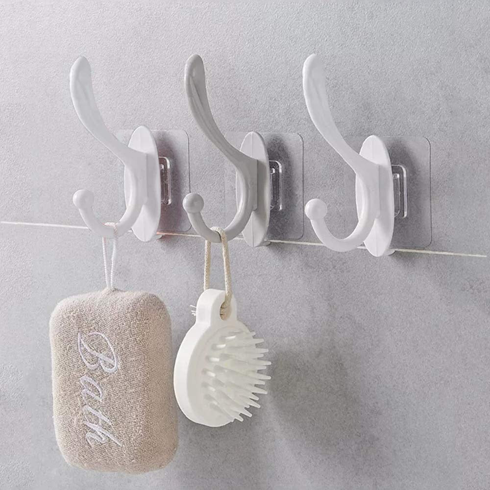 Close-up of a clear plastic self adhesive wall hook, ready for drill-free installation.
