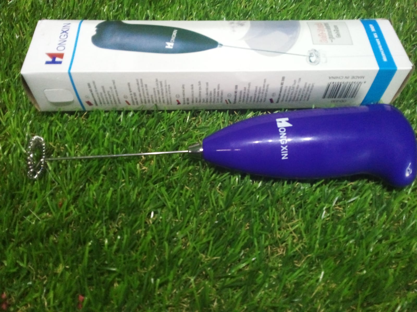 Hand Blender packaging, highlighting key features and brand logo.