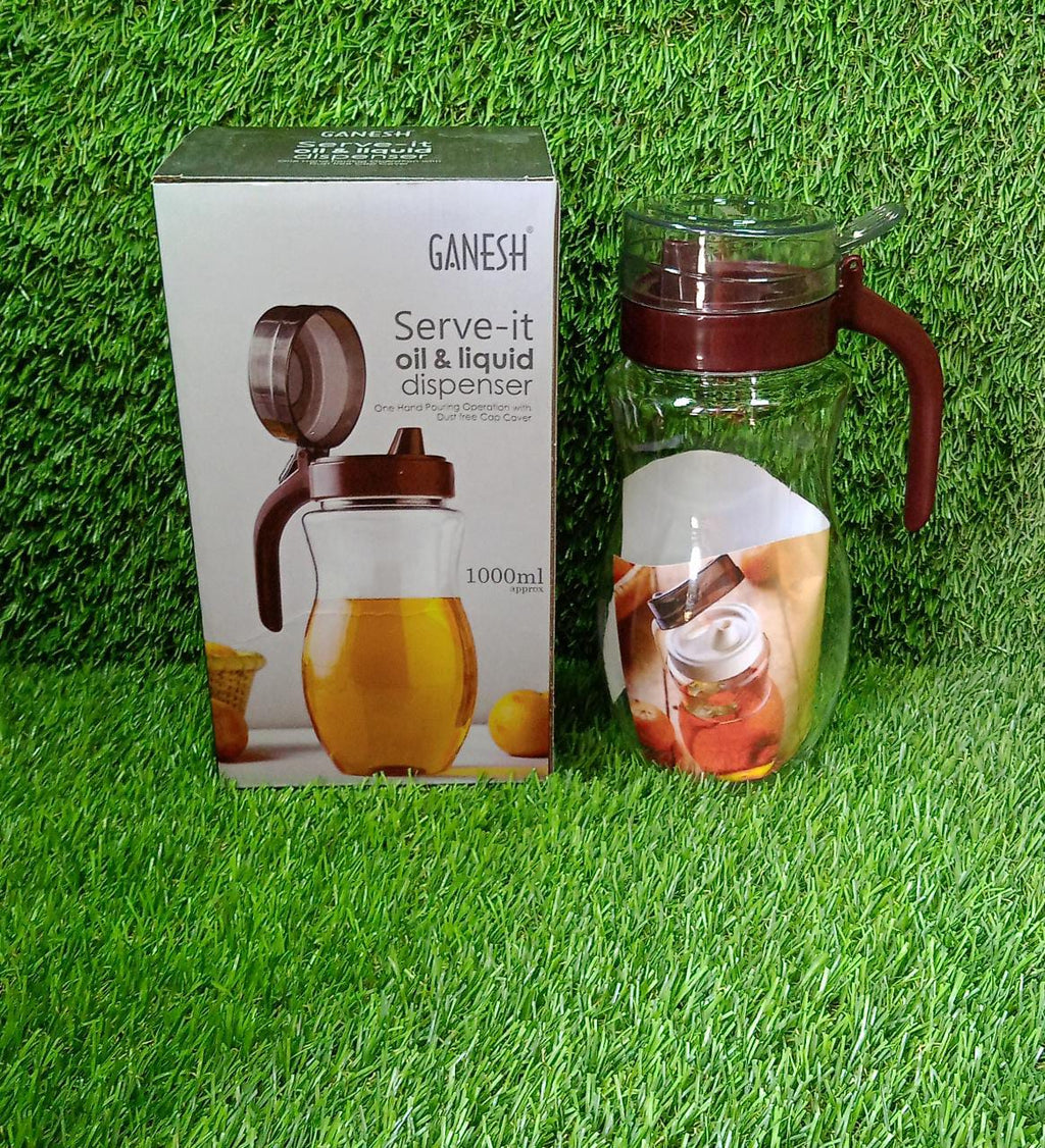 Ganesh 1000ml stainless steel oil dispenser on a kitchen counter.