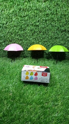 Vertical shot of the multi-functional umbrella wall hook, showcasing its hanging capabilities.