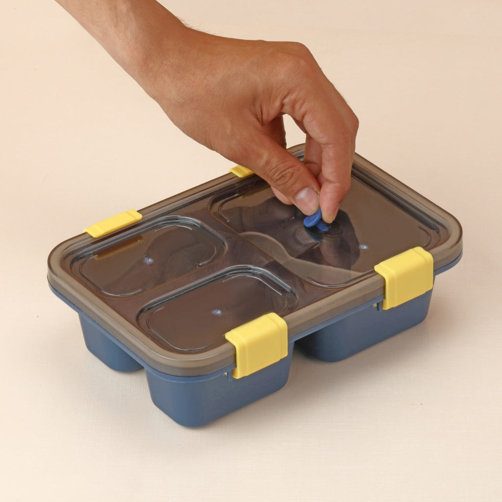 A kids lunch box filled with healthy, portioned food for school.