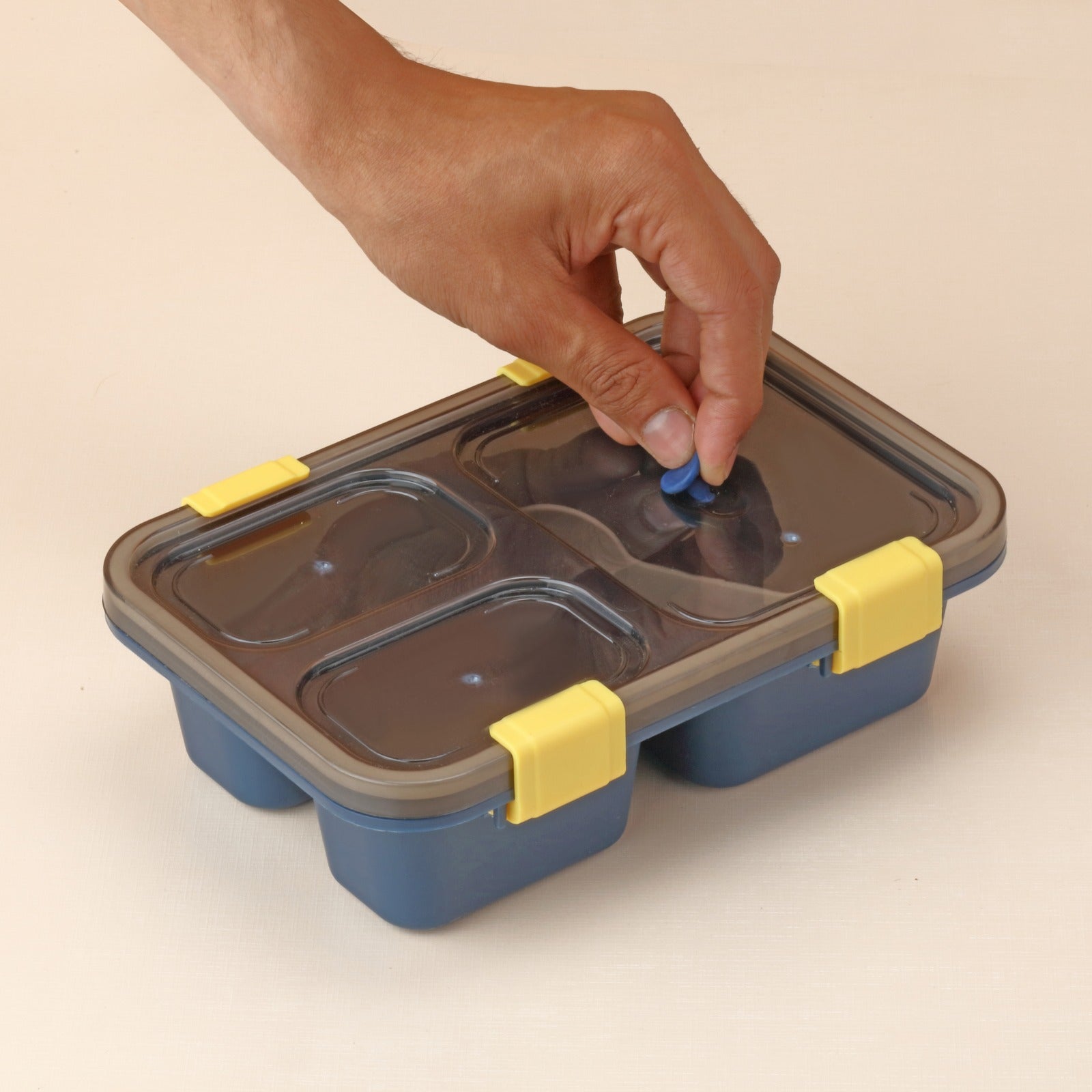 A kids lunch box filled with healthy, portioned food for school.