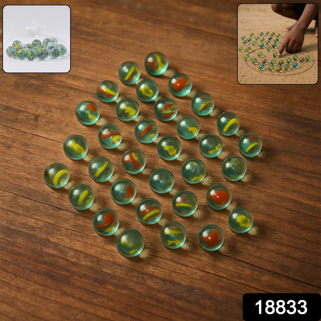 Set of assorted glass marbles for kids featuring traditional kancha game colors and designs