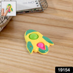 Hand holding the compact rocket fidget keychain toy showing its size