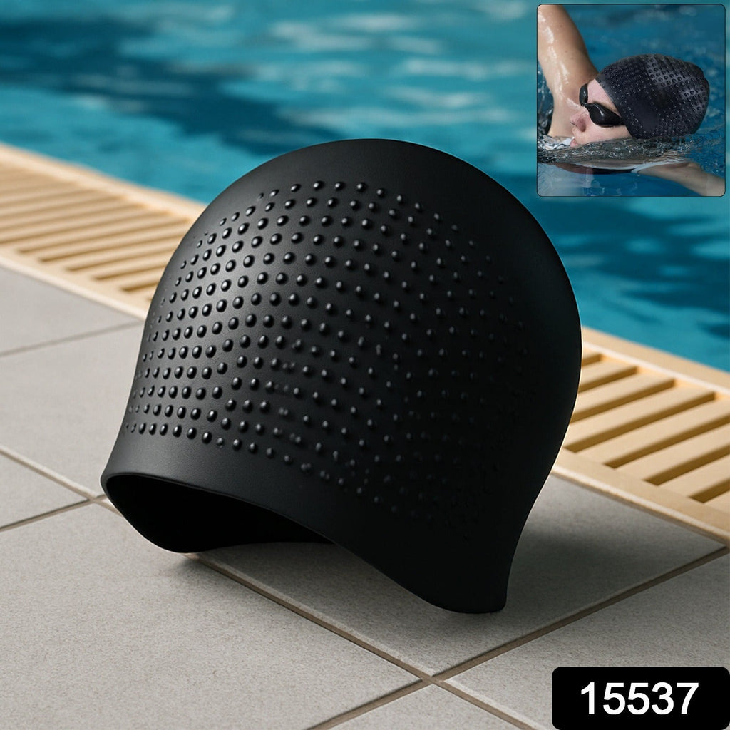 Swimmer wearing silicone swimming cap in pool water