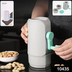 User demonstrating the manual operation of the peanut sheller machine.
