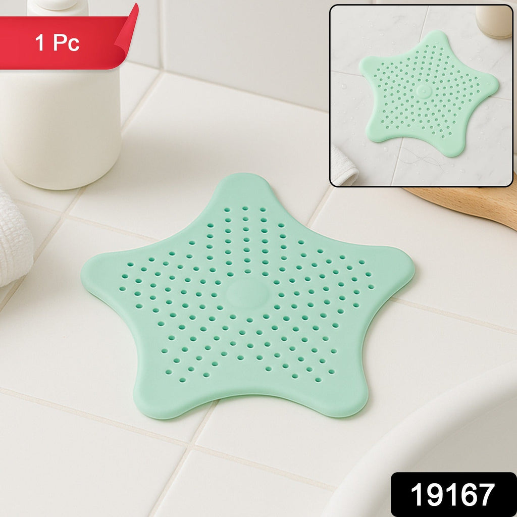 Close-up of mint green silicone sink drain stopper and hair catcher showing star shape design