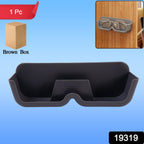 Sunglasses hanging neatly on wall-mounted holder slots