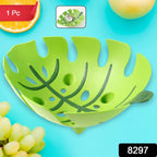 Green plastic fruit basket ideal for kitchen storage of fruits and vegetables