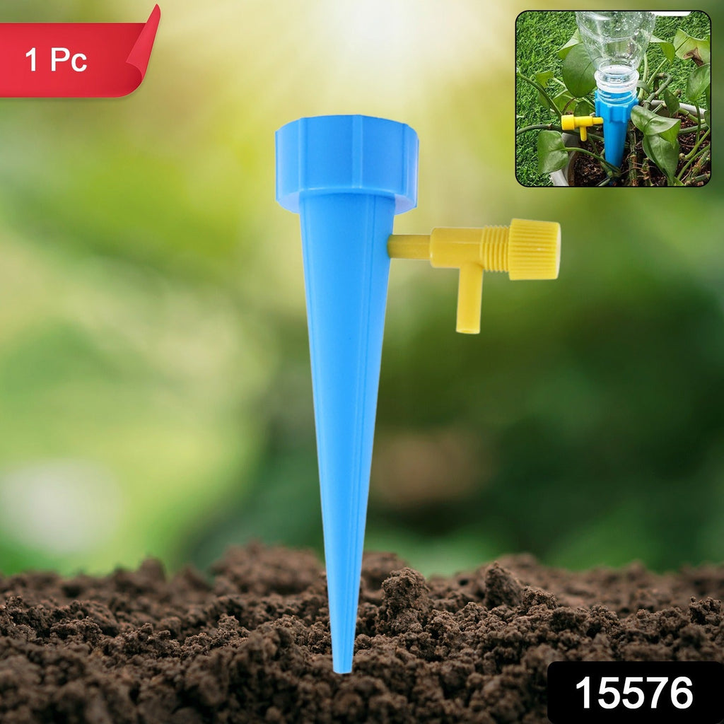 Adjustable blue watering spike connected to bottle for slow water release