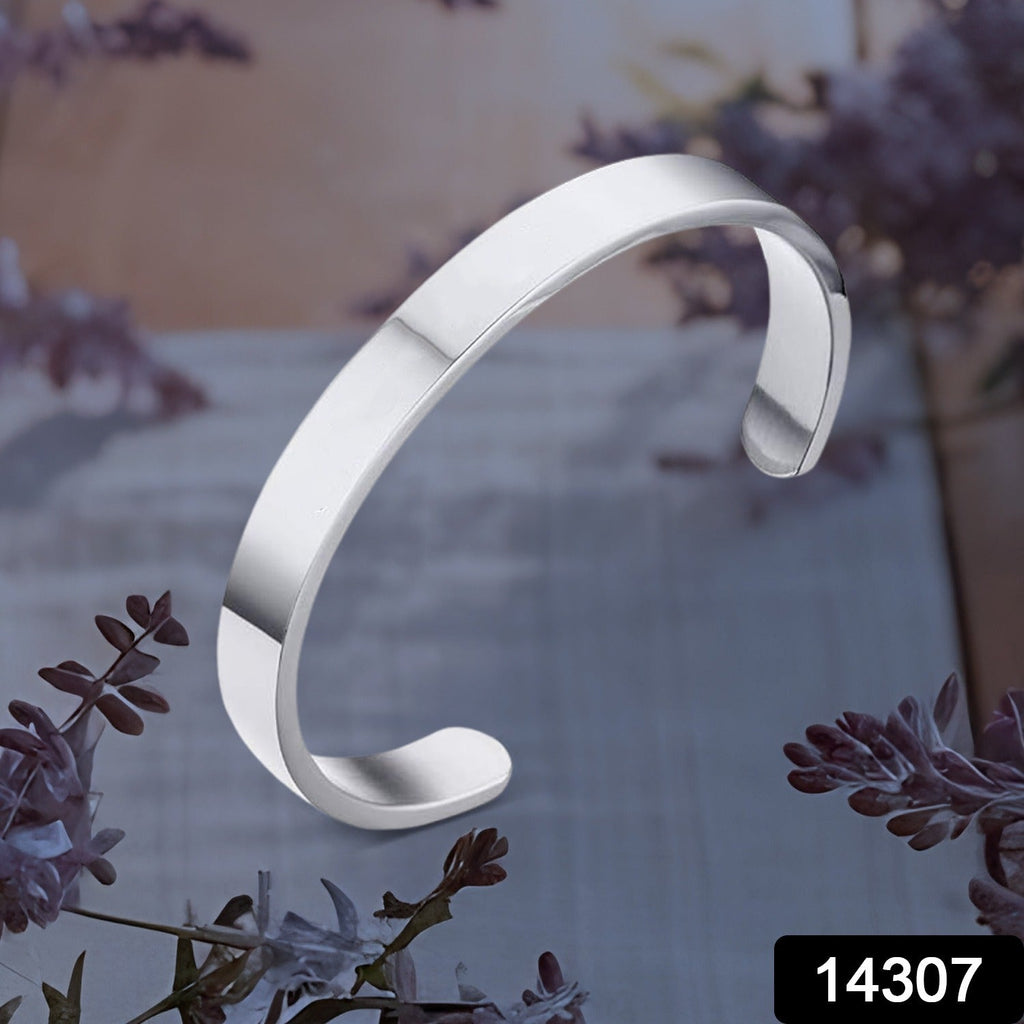 Polished stainless steel cuff bracelet showing smooth silver finish