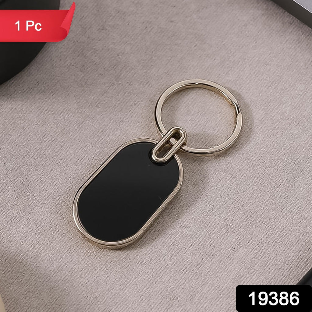 Sleek twin tone oval keychain in black and silver finish
