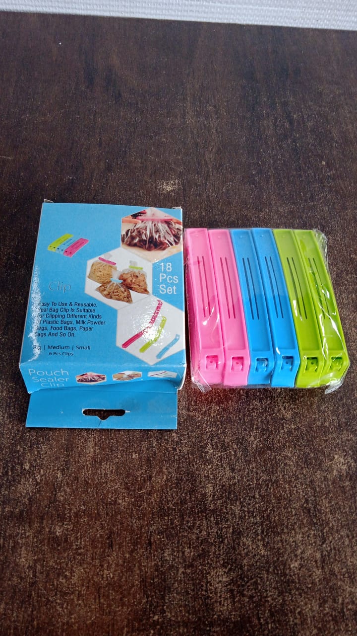 Plastic clips sealing different sized food bags with airtight hold