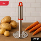 Potato masher mashing cooked potatoes in a bowl for smooth texture