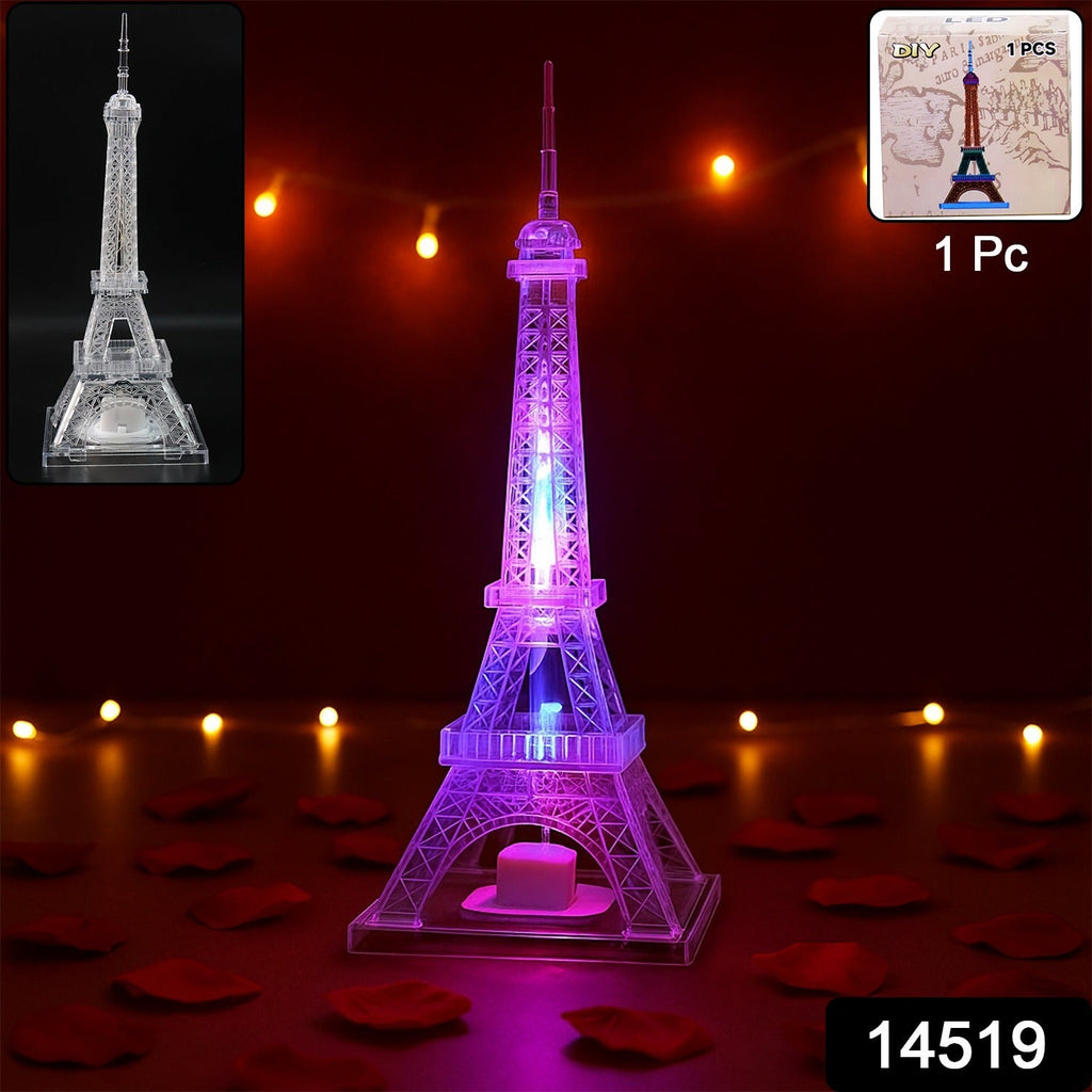 Multicolor LED Eiffel Tower night light glowing softly in a dark room