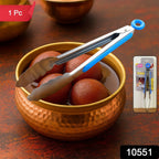 Close-up of chef serving tong suitable for cooking and serving