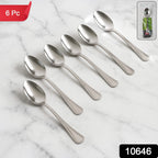Six stainless steel dining spoons neatly arranged in a set