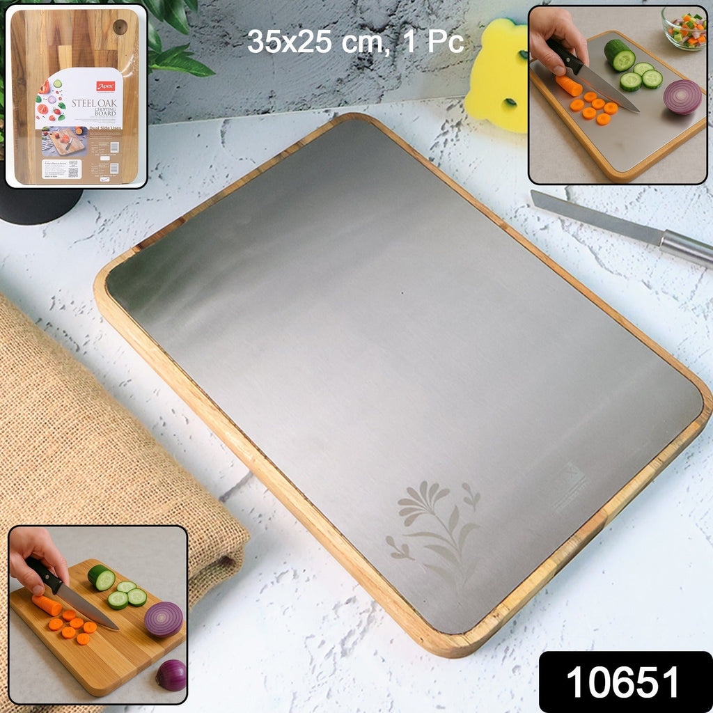 Cutting board in kitchen environment highlighting wooden frame and stainless steel surface