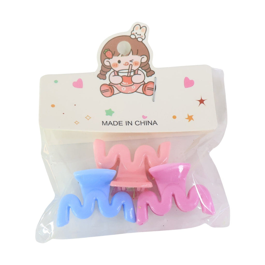 Mini hair clips packaged in a clear box, ready for gifting.