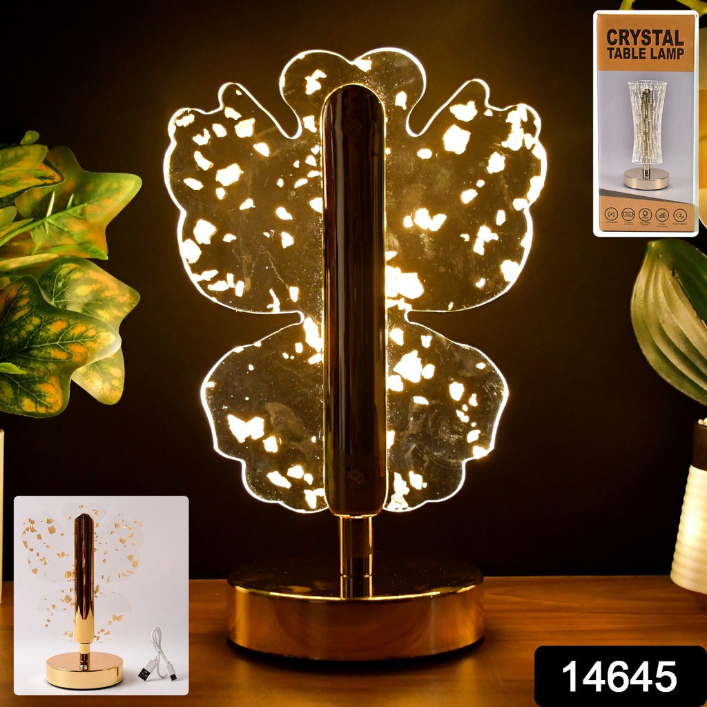 Golden base of crystal butterfly LED table lamp showing metallic finish