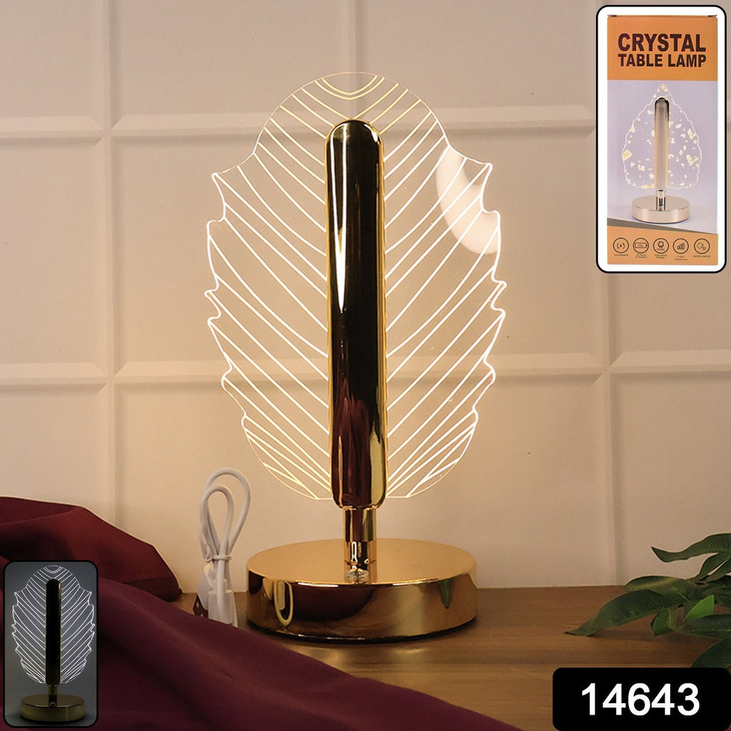 Premium crystal table lamp featuring leaf-patterned acrylic shade