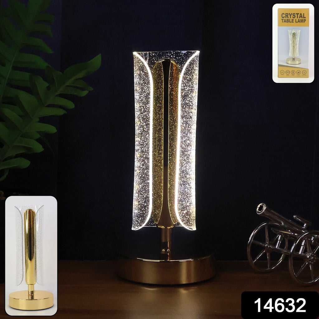 Tall cylindrical crystal table lamp illuminating study desk