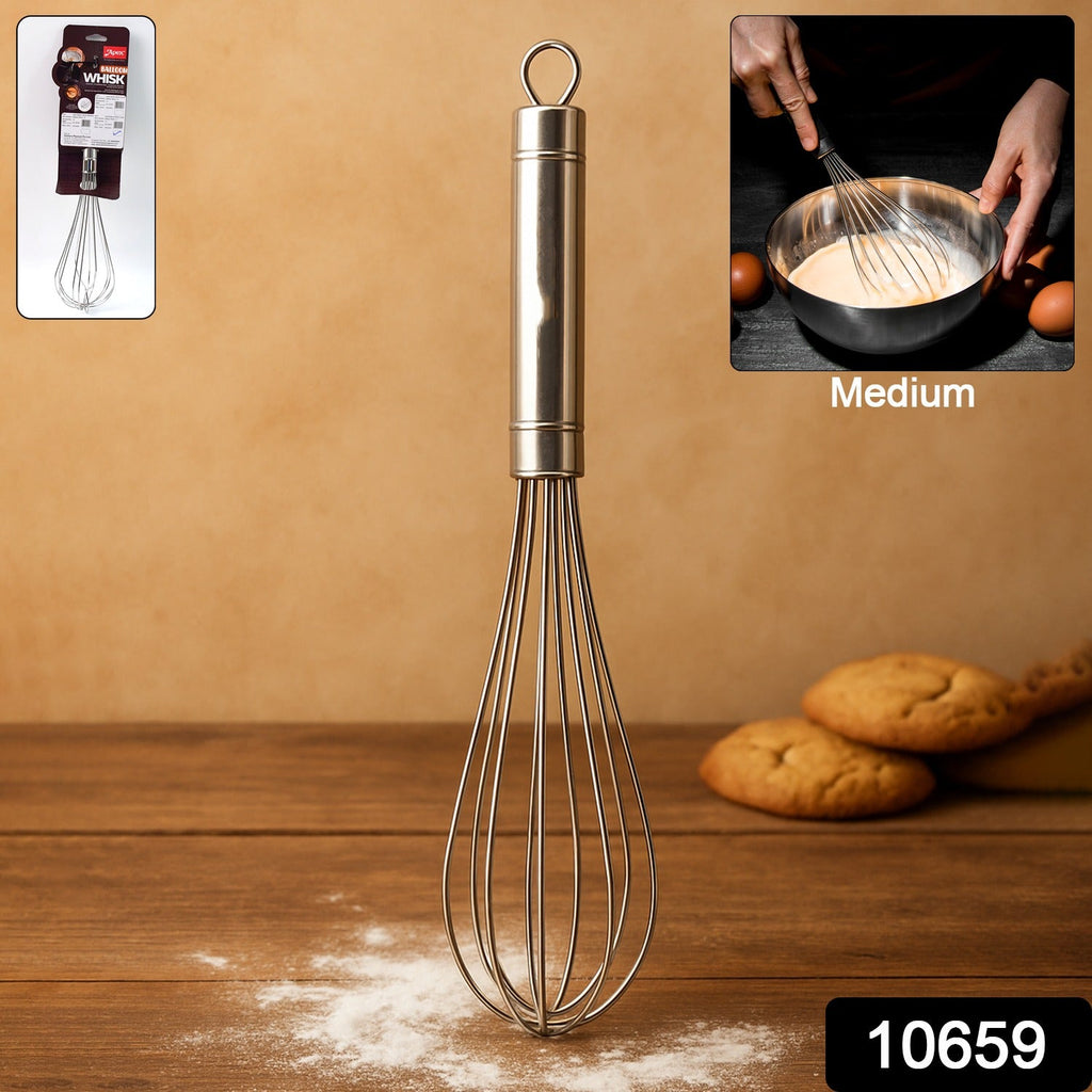 Stainless steel hand whisk used in kitchen for mixing ingredients