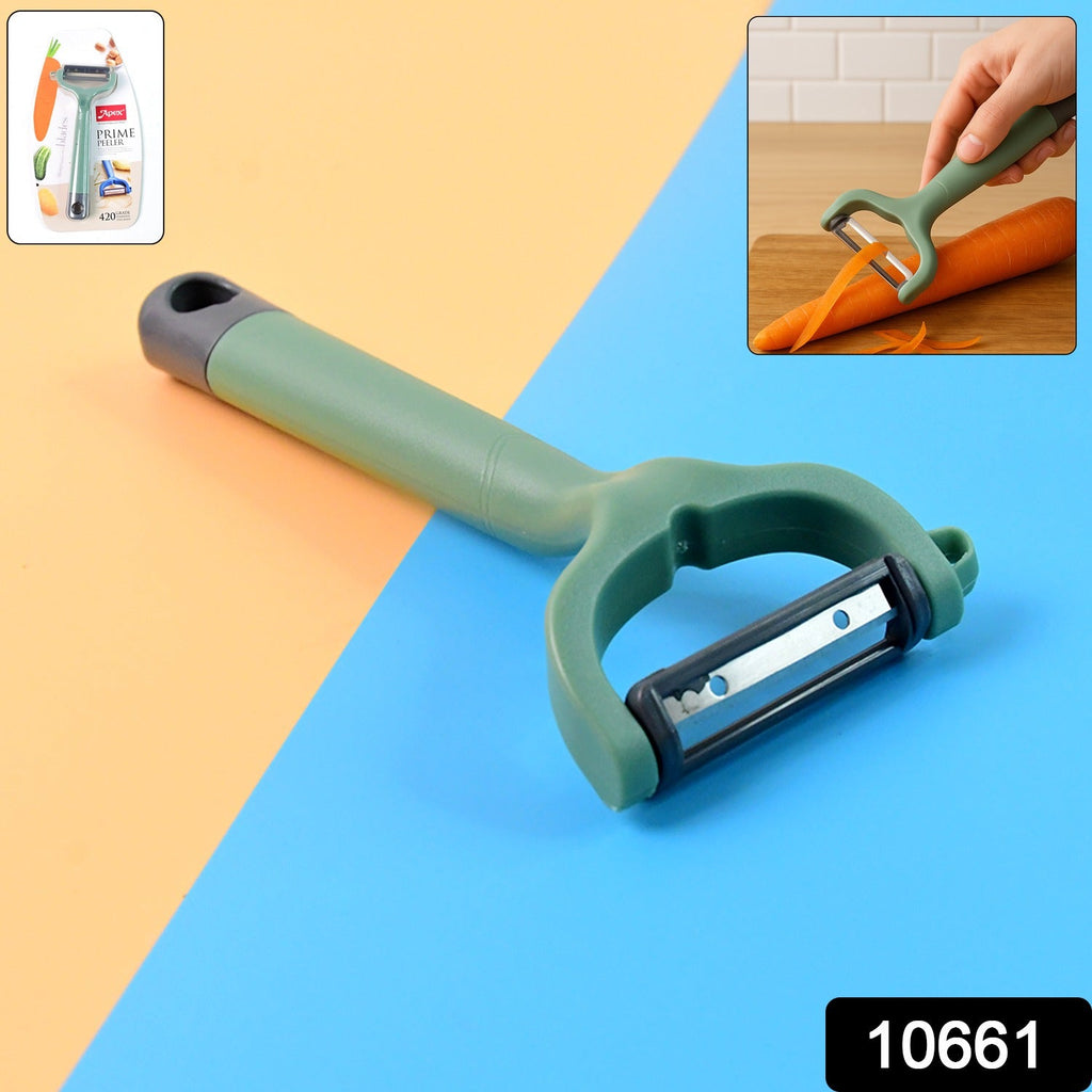 Close-up of vegetable peeler with sharp stainless steel blade for peeling carrots and cucumbers