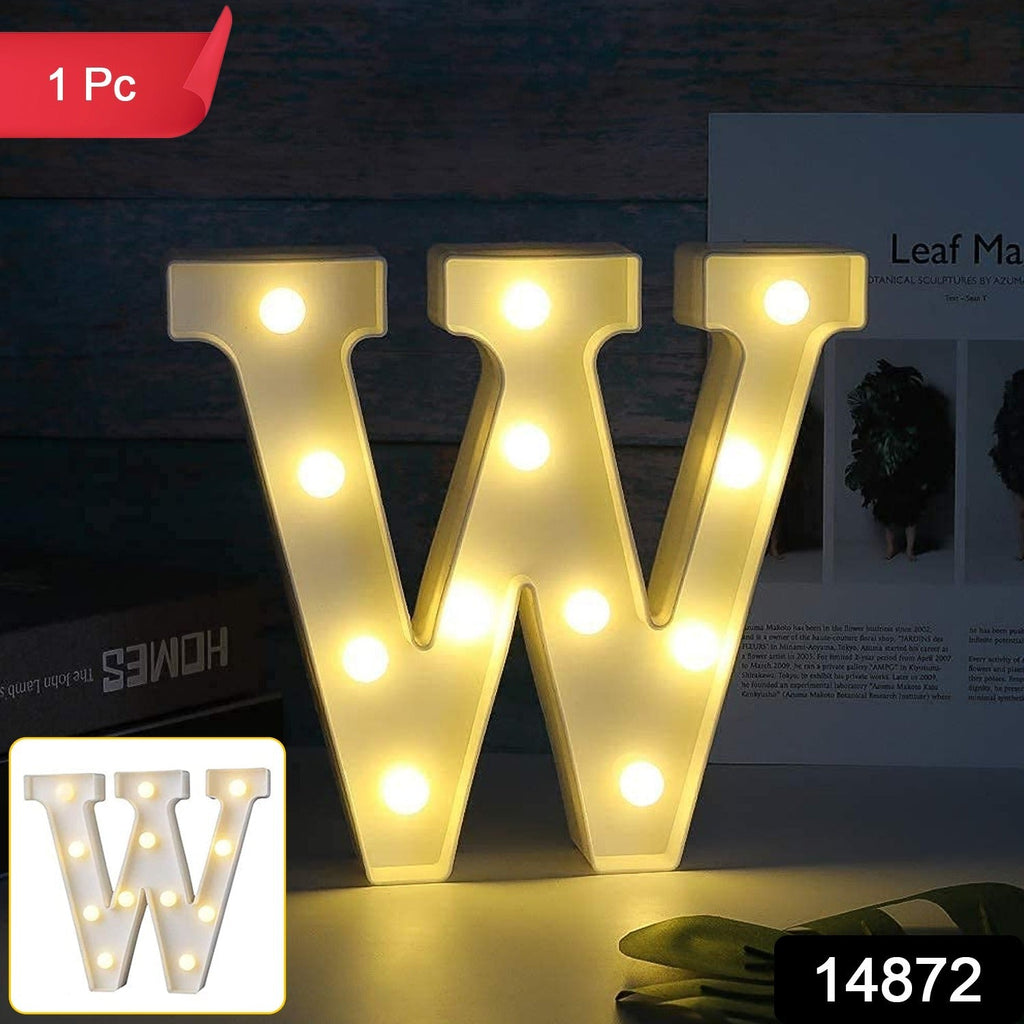 Battery operated W shaped night lamp illuminating kids bedroom softly