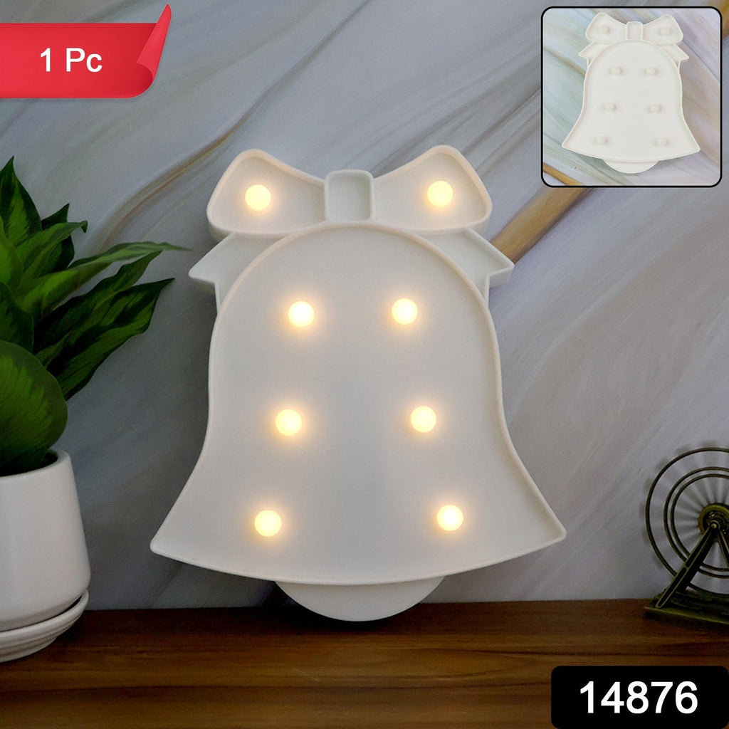 Illuminated pink LED Bell Shaped Night Light adding soft glow to room