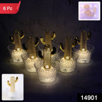 Close-up of cactus LED decorative candle showing golden cactus inside transparent holder