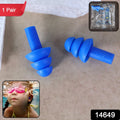 Close-up of swimming ear plugs with triple-flange silicone design