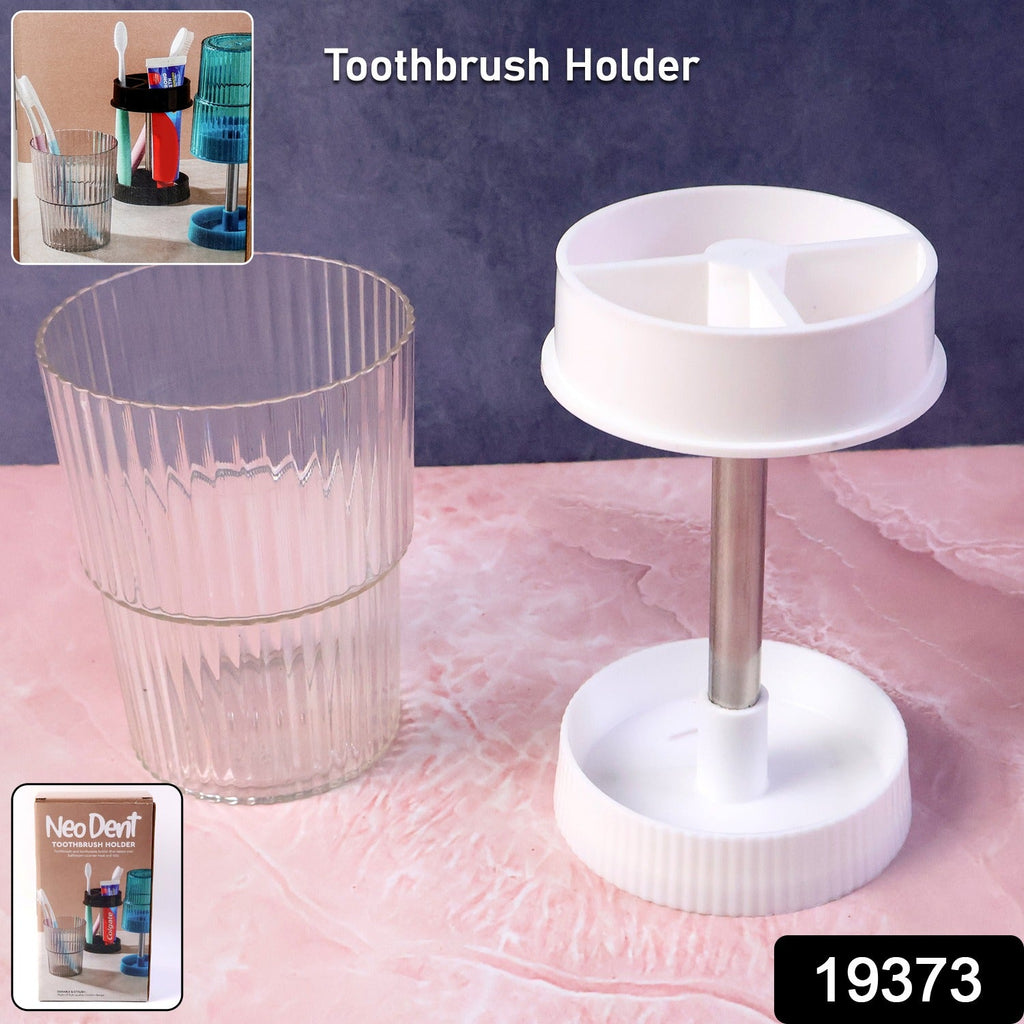 Rotating toothbrush holder placed on bathroom countertop showing smooth rotation feature