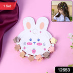 Mini hair claw clips arranged on a bunny-themed display card for kids