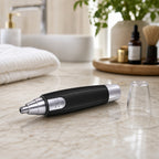 Top view of the battery-operated nose hair trimmer demonstrating its precision tip.