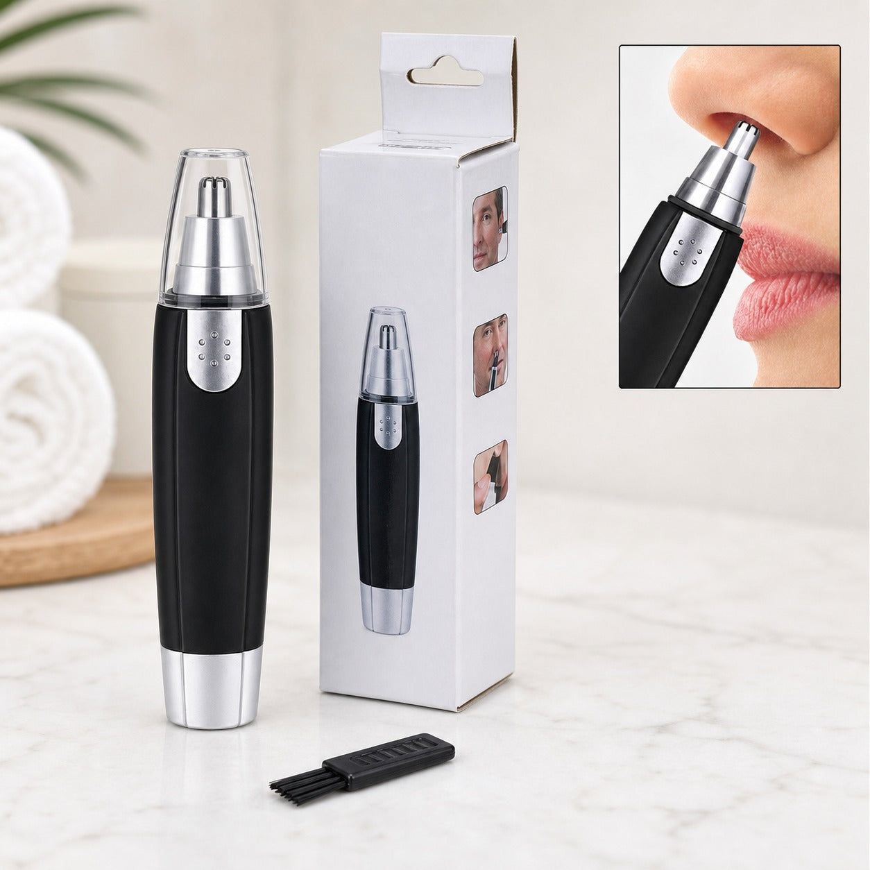 Front view of a sleek, battery-operated ear and nose hair trimmer by Calm & Curl.